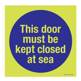 THIS DOOR MUST KEPT CLOSED AT SEA