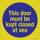 THIS DOOR MUST KEPT CLOSED AT SEA